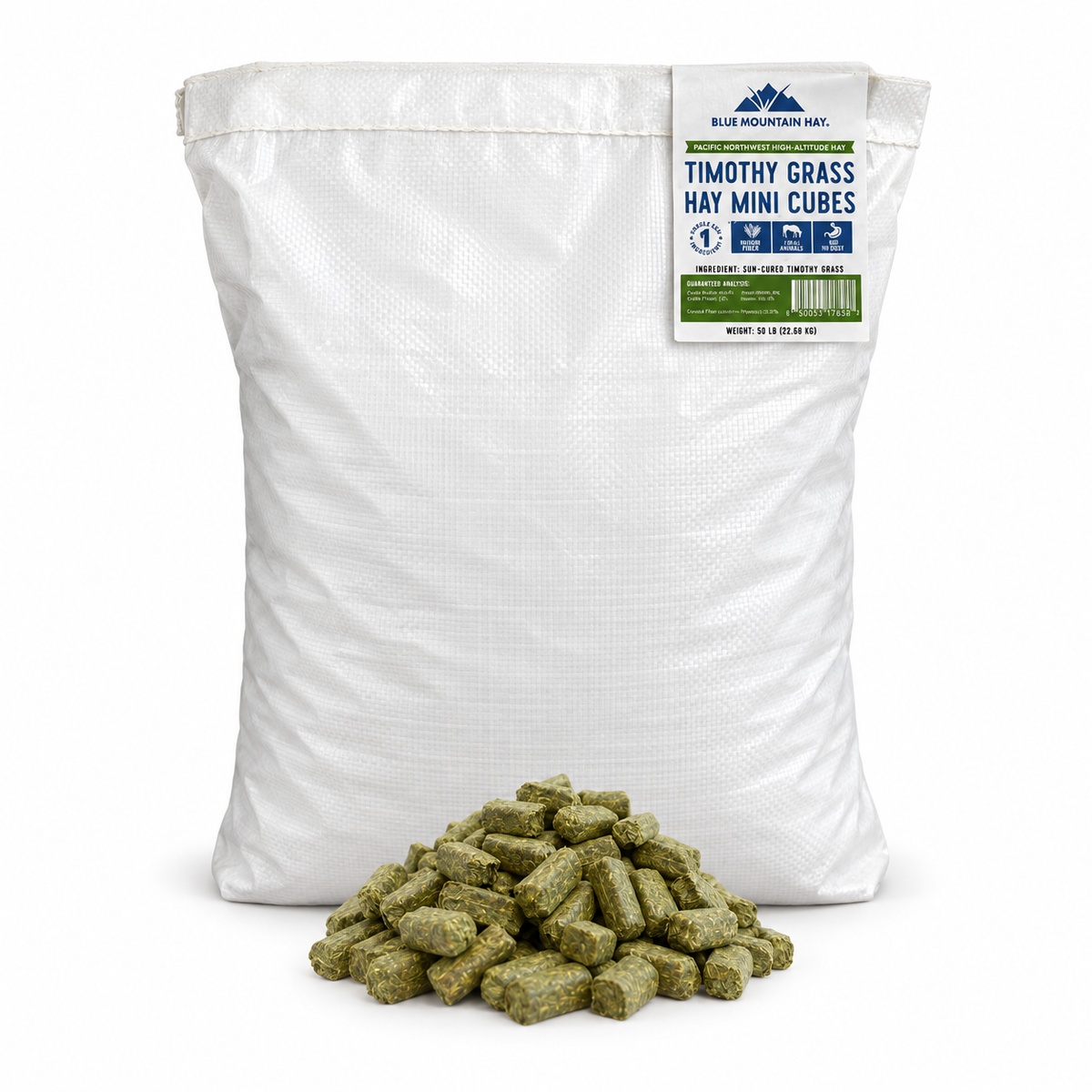 A large white bag of Blue Mountain Co. Timothy Grass Hay Mini Cubes with a pile of green-brown textured hay cubes in front, photographed on a clean white background.