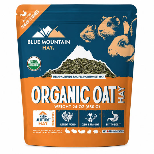 Blue Mountain Hay Organic Oat Hay package with mountain and animal illustrations on a white background