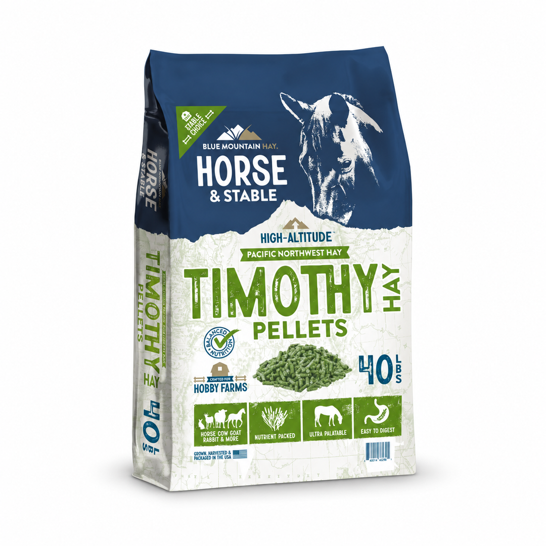 A 40 lb bag of Blue Mountain Hay Timothy Hay Pellets for horses, featuring a navy blue and off-white design with green text and a horse illustration.