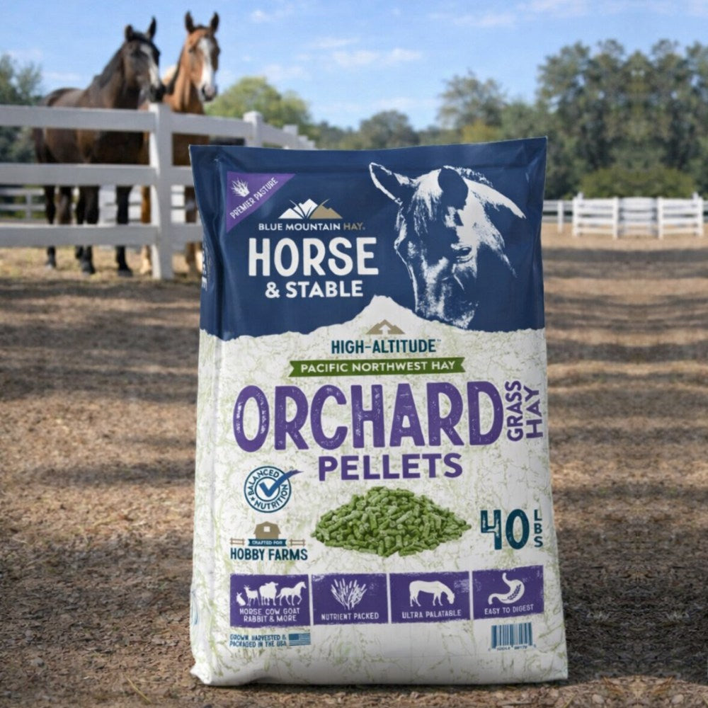 Bag of Blue Mountain Hay Orchard Pellets with horses in the background